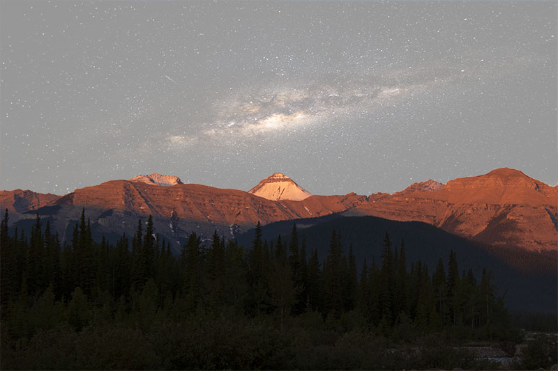 Mountain Sunrise with Galaxy